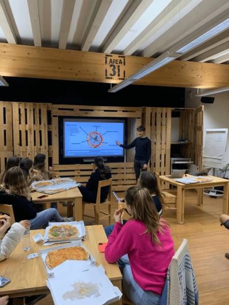 Orlando Recchi teaching an Italian class for the IE Italian Society at IE's Creativity Center.